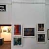 Multiple framed artworks displayed with Artiteq Perlon & Loop system on a Victorian-style timber picture rail