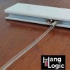 Close-up of a tightened stopper next to a solid slider, preventing it from sliding away.