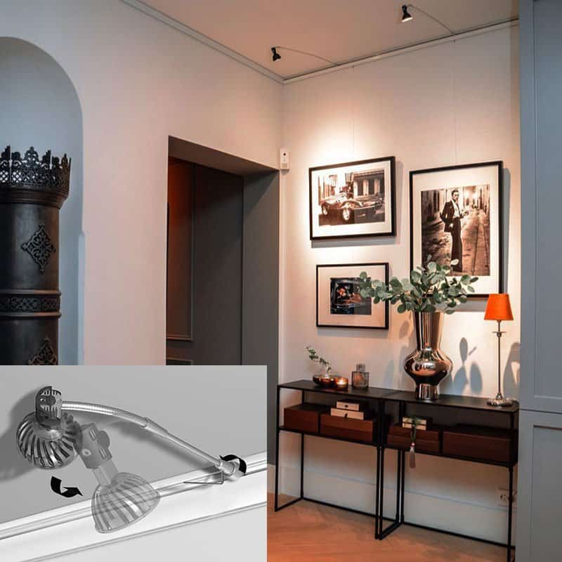 Artiteq Combi Rail Pro Light system displaying three photos with integrated lighting, available at Hang Logic.