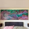 Long abstract canvas above bed hung from hidden ArtiTeq Shadowline Drywall picture rail with slim ceiling reveal