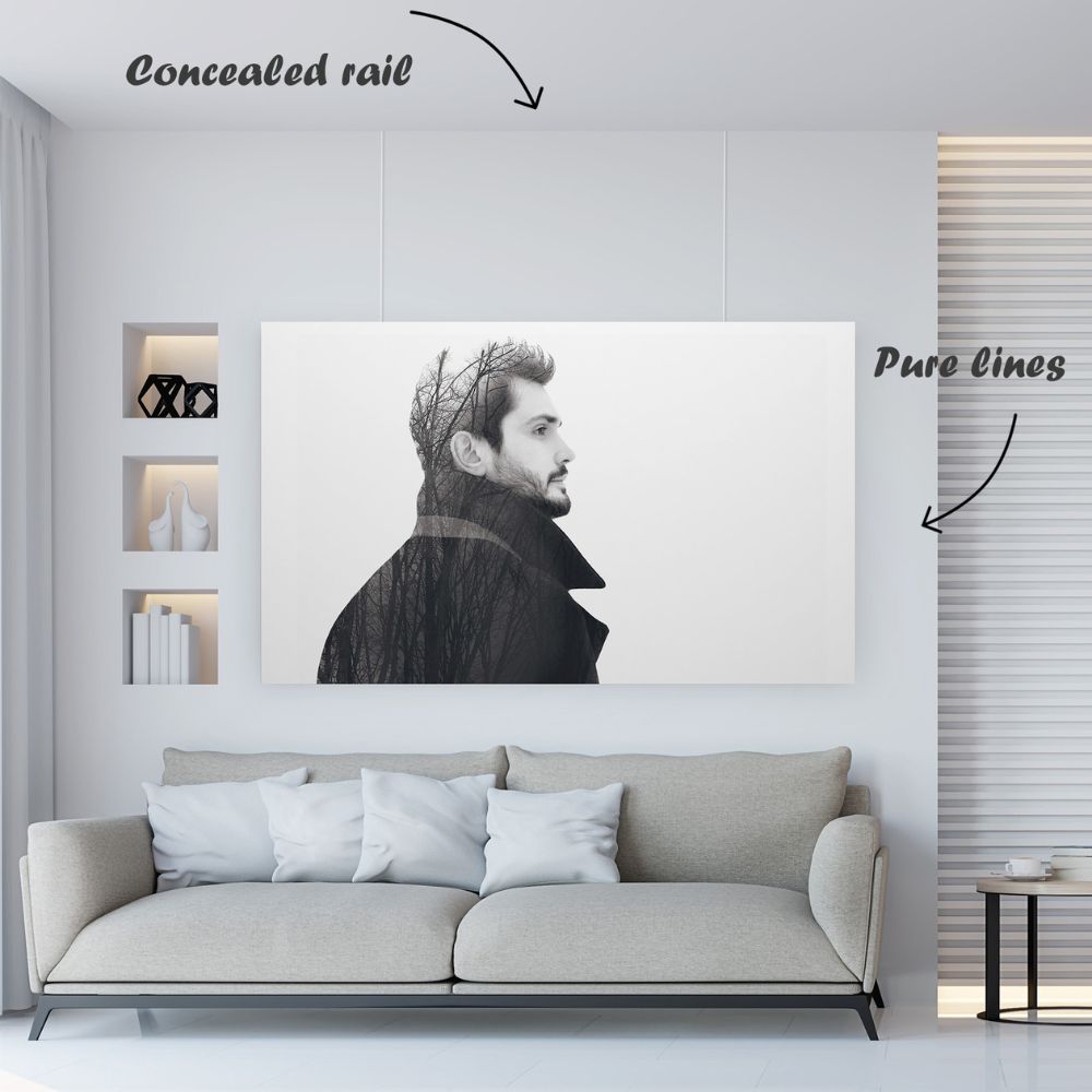 ArtiTeq Shadowline Masonry Picture Rail Large black-and-white portrait hanging on thin wires from a concealed ArtiTeq Shadowline Masonry picture rail.